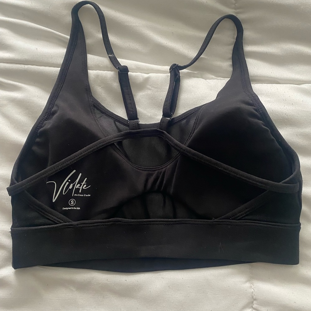 Size small new without tags Black Violate the Dresscode sports bra.